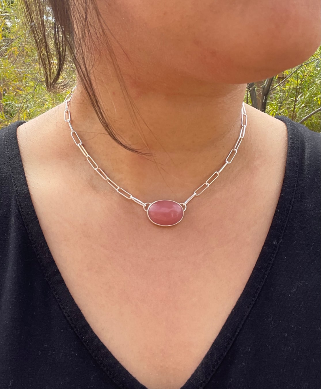sterling silver paper clip chain choker necklace with an oval shaped pink guava quartz stone