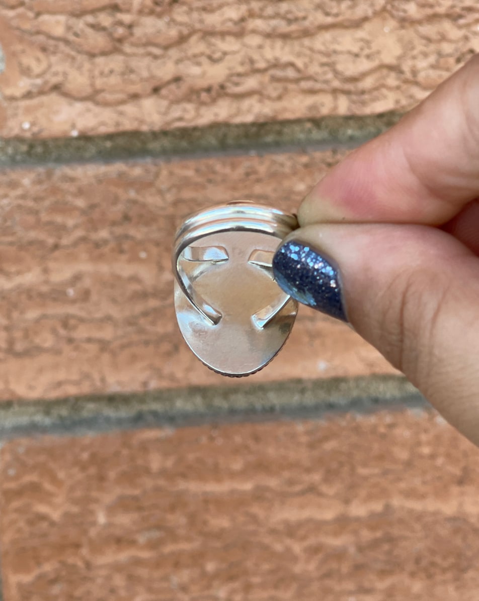 Larimar coffin stone moon phase ring with split ring band.