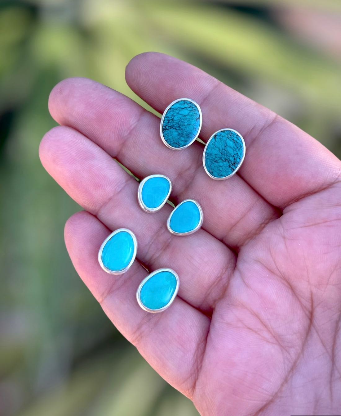 Three pairs of turquoise stud earrings