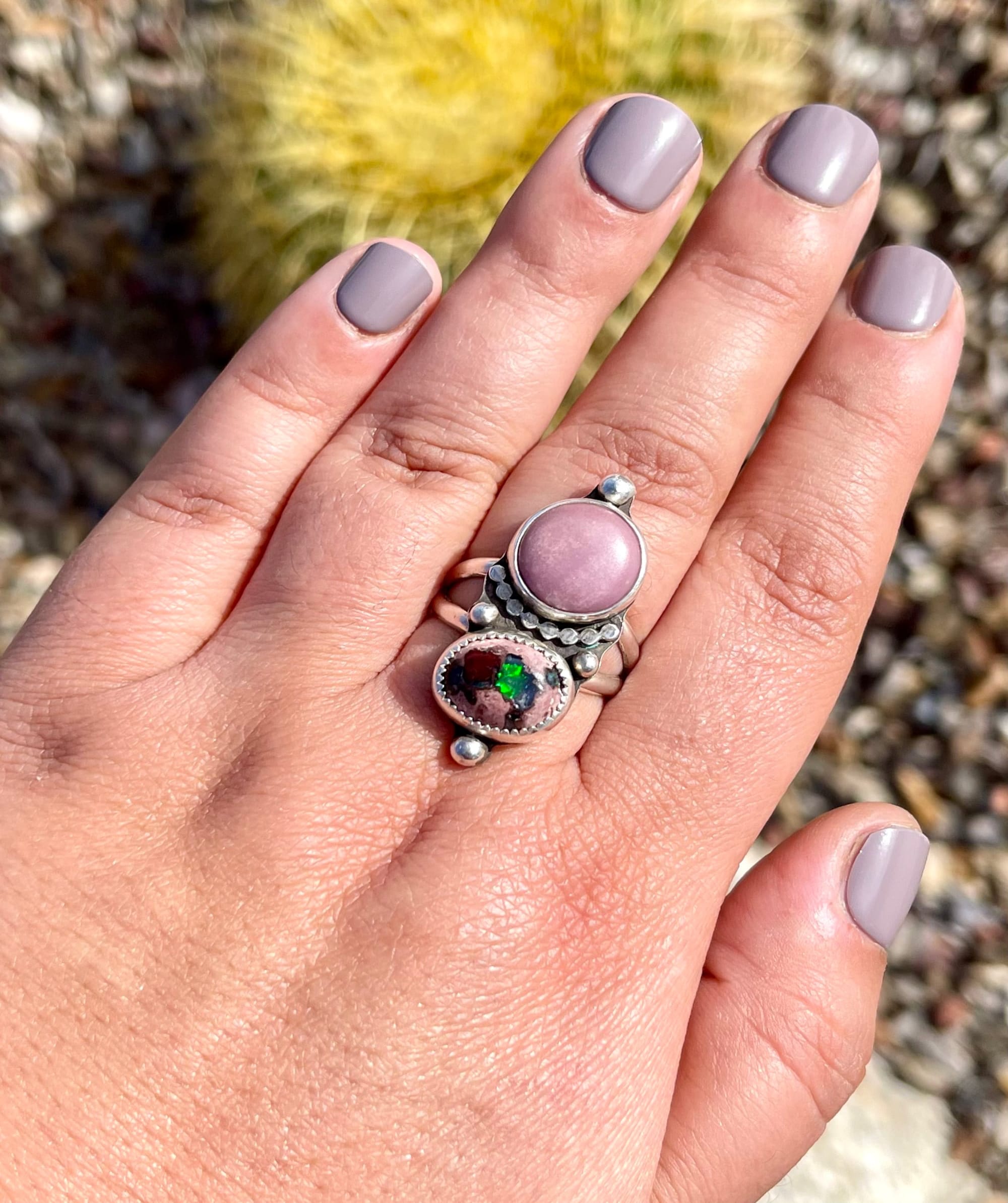 cantera opal and phosphosiderite sterling ring on hand