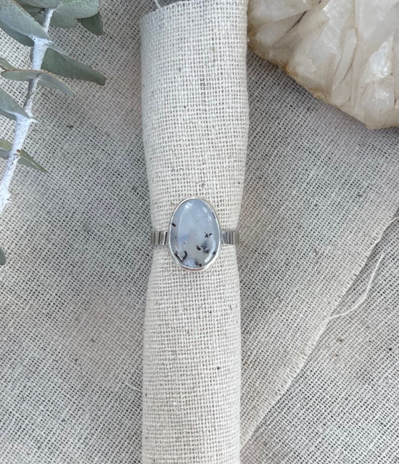 Handmade sterling silver white dendritic agate stone solitaire ring with a rustic line stamped band